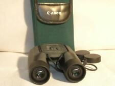 Compact Canon 10x25A 5.2 Degree Center Focus Rubberized Palm Size Binoculars picture