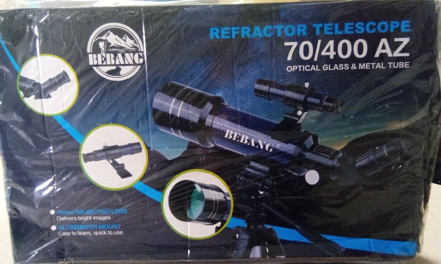 Bebang Refractor Telescope 70/400 AZ with tripod. Box slightly damaged 